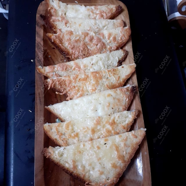 Tasty Chilli Cheese Toast cooked by COOX chefs cooks during occasions parties events at home