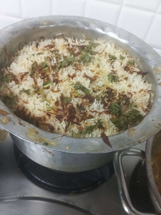 Delicious Mutton Biryani prepared by COOX