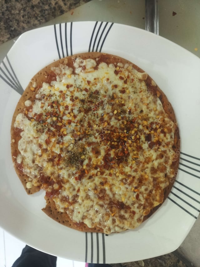 Delicious Margherita Pizza prepared by COOX