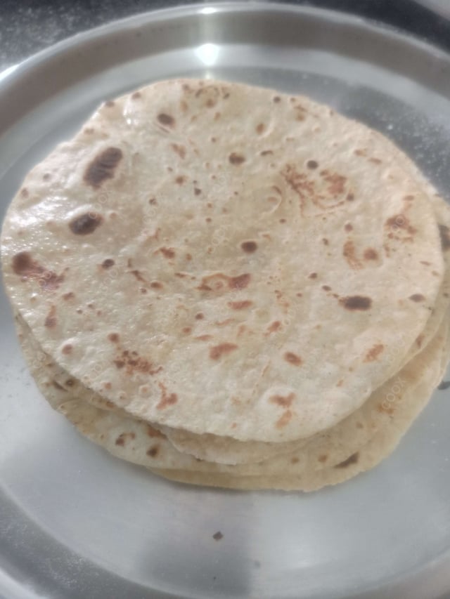 Delicious Tawa Rotis prepared by COOX