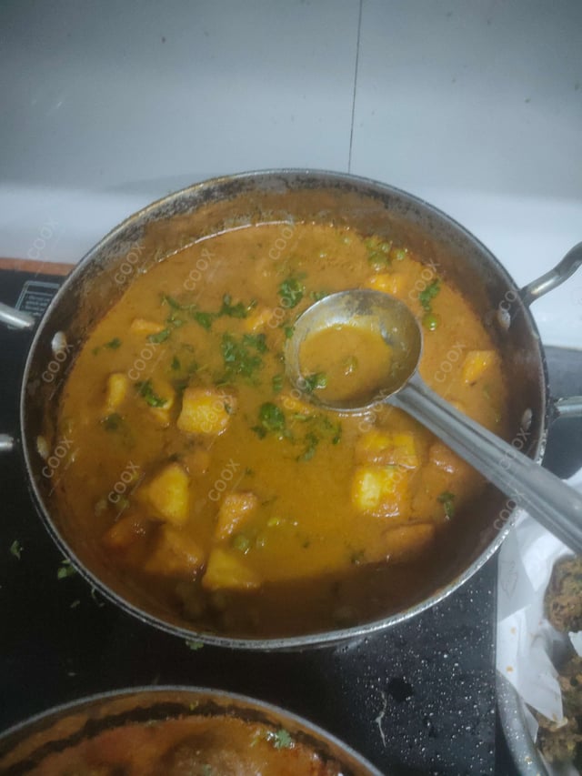 Delicious Matar Paneer prepared by COOX