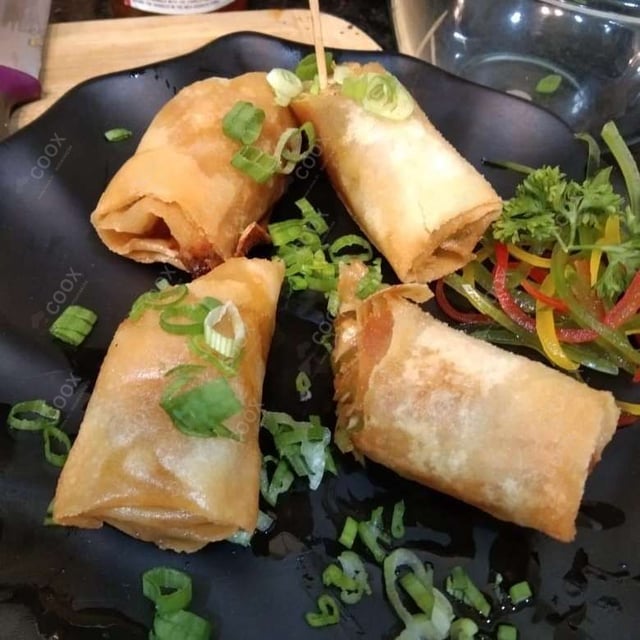 Tasty Veg Spring Rolls cooked by COOX chefs cooks during occasions parties events at home