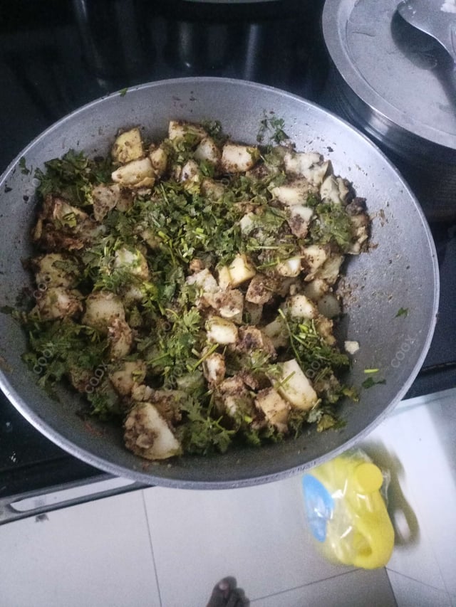 Delicious Jeera Aloo prepared by COOX