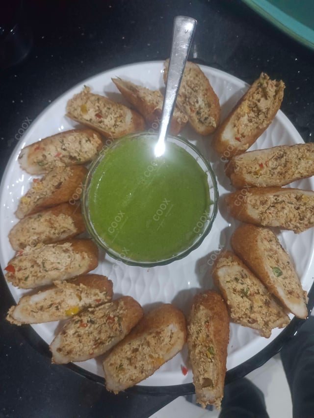 Delicious Dahi ke Sholey prepared by COOX