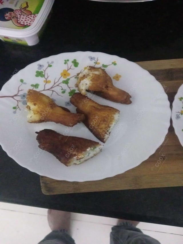 Delicious Dahi ke Sholey prepared by COOX