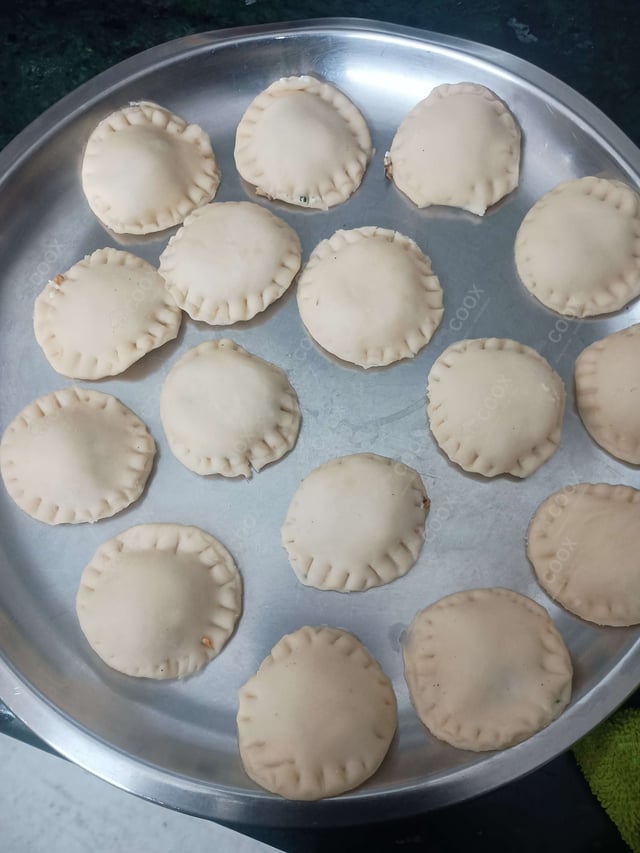 Delicious Ravioli in Pink Sauce prepared by COOX