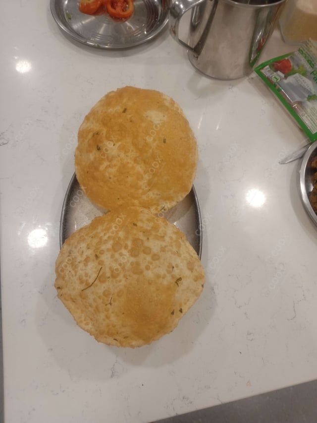 Tasty Bhature cooked by COOX chefs cooks during occasions parties events at home