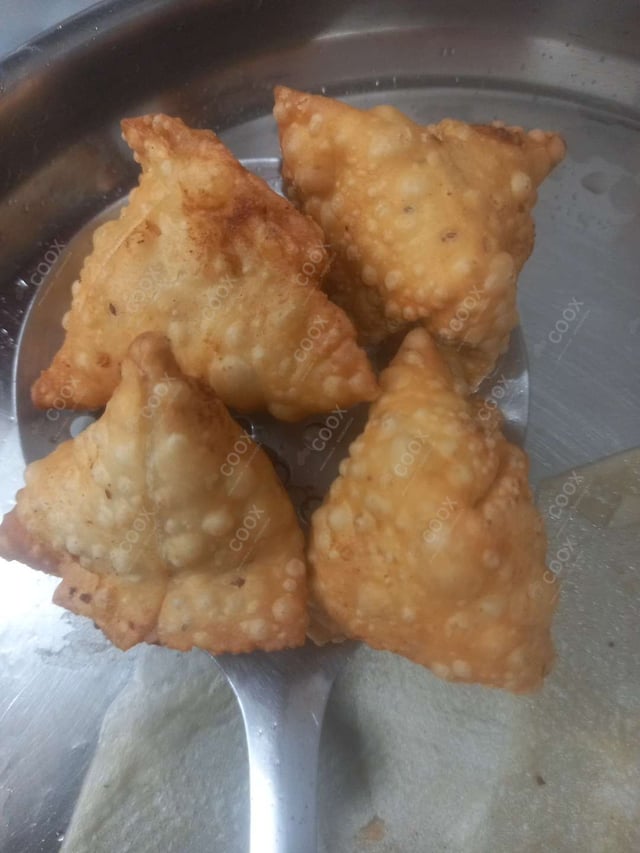 Delicious Mini Samosas prepared by COOX
