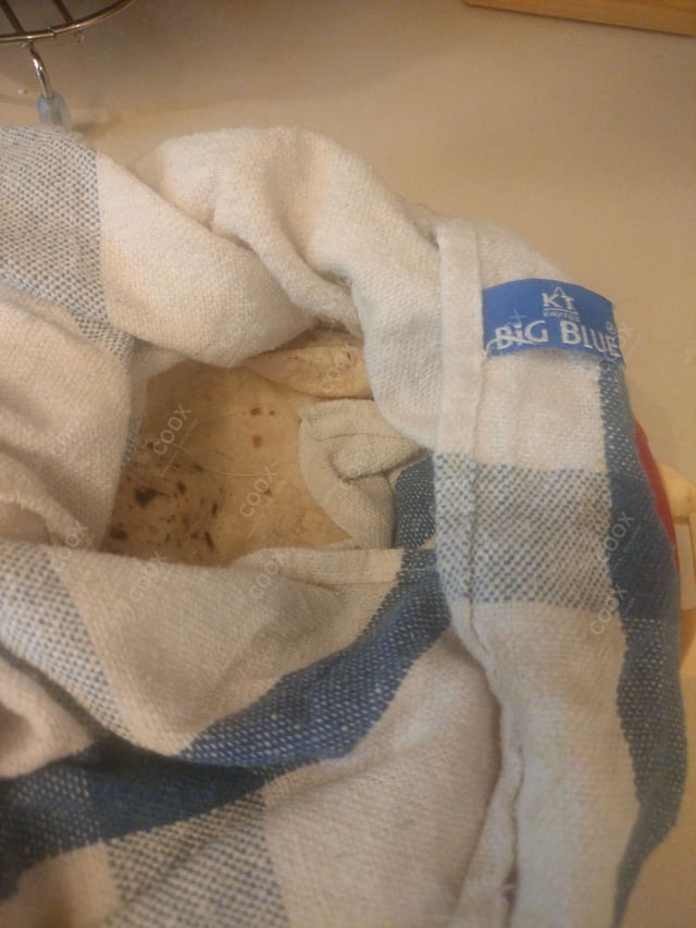 Delicious Tawa Rotis prepared by COOX