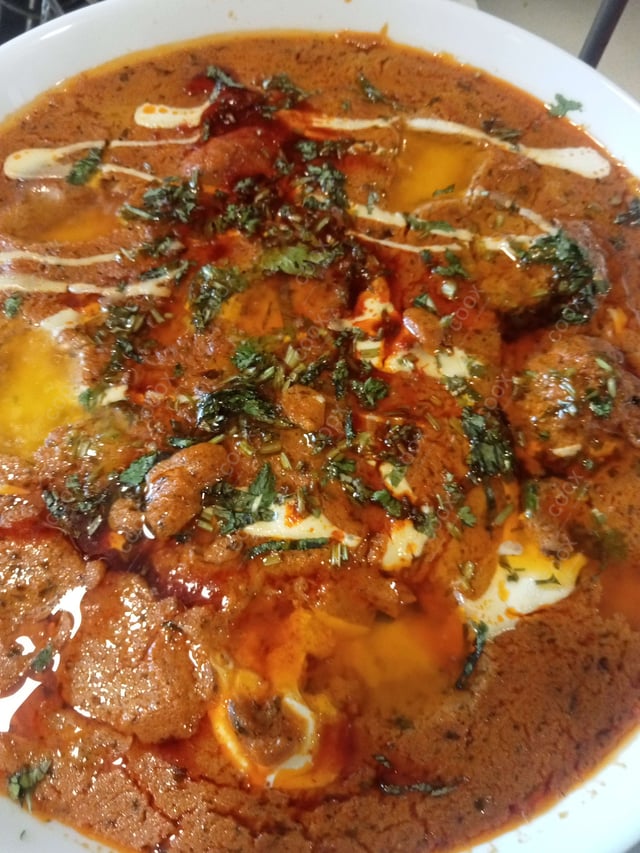 Delicious Stuffed Potatoes (Gravy) prepared by COOX