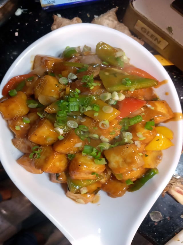 Delicious Chilli Paneer (Dry) prepared by COOX