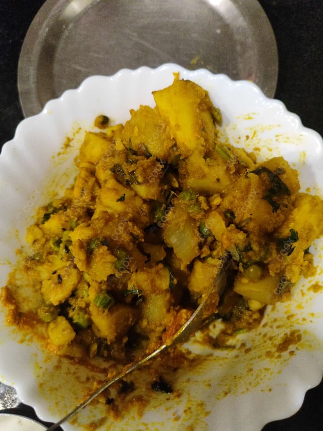 Delicious Dum Aloo prepared by COOX
