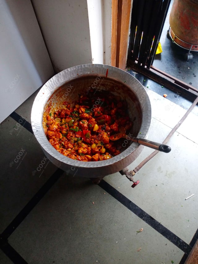 Delicious Kung Pao Chicken prepared by COOX