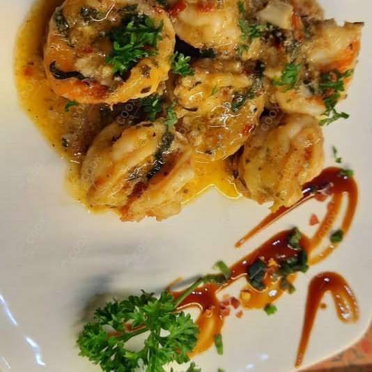 Tasty Butter Garlic Prawns cooked by COOX chefs cooks during occasions parties events at home