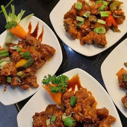 Tasty Chilli  Chicken cooked by COOX chefs cooks during occasions parties events at home
