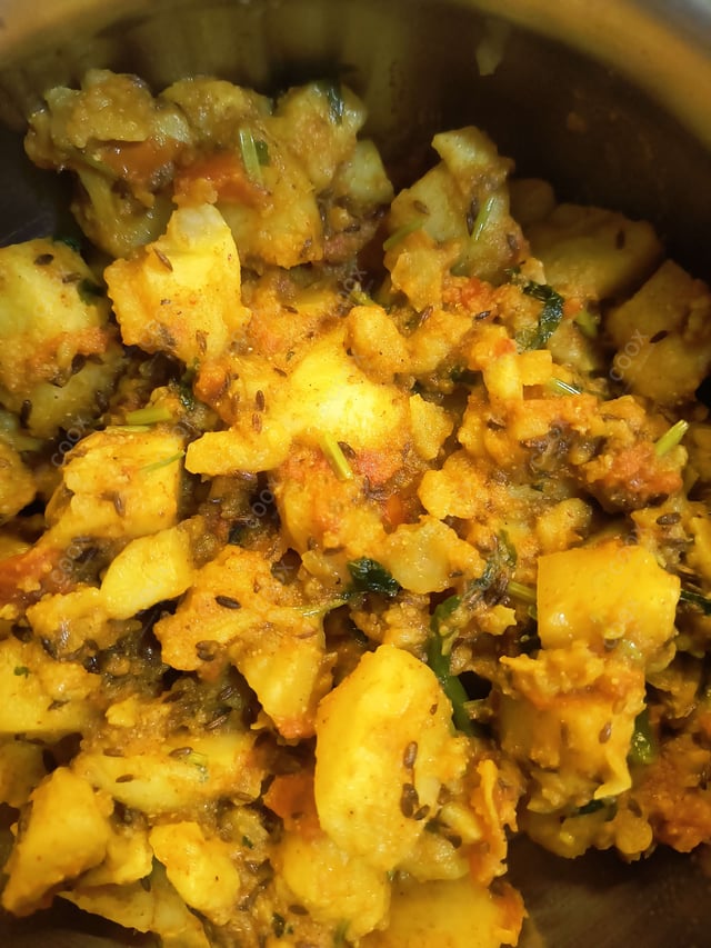 Delicious Jeera Aloo prepared by COOX