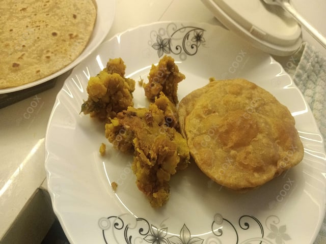 Tasty Poori Bhaji cooked by COOX chefs cooks during occasions parties events at home