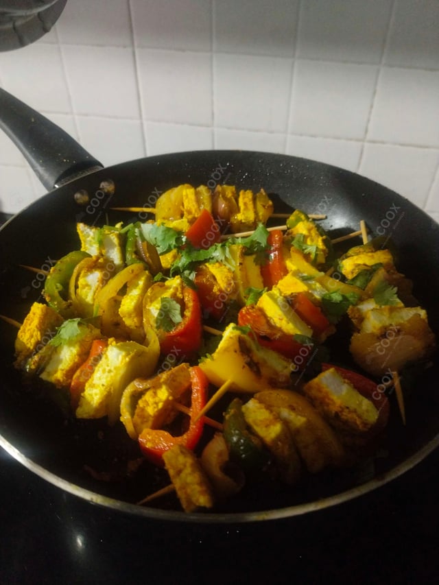 Delicious Paneer Tikka prepared by COOX