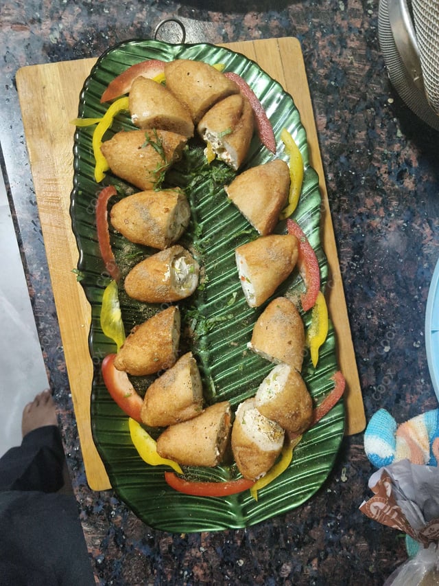 Delicious Dahi ke Sholey prepared by COOX