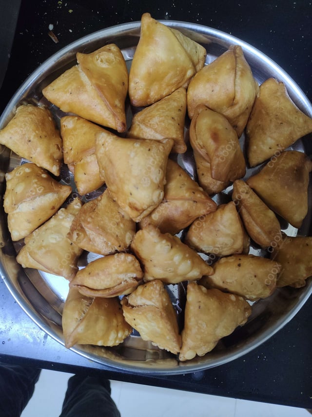 Tasty Dal Samosas cooked by COOX chefs cooks during occasions parties events at home