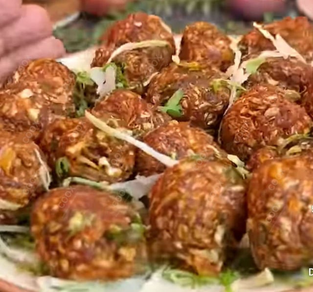 Delicious Veg Manchurian (Dry) prepared by COOX