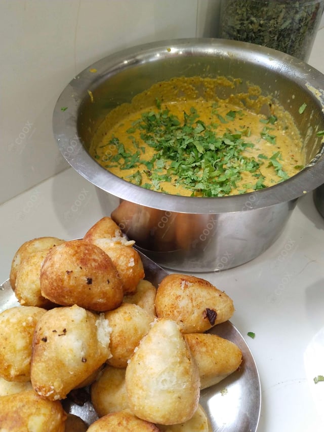 Tasty Malai Kofta (White Gravy) cooked by COOX chefs cooks during occasions parties events at home