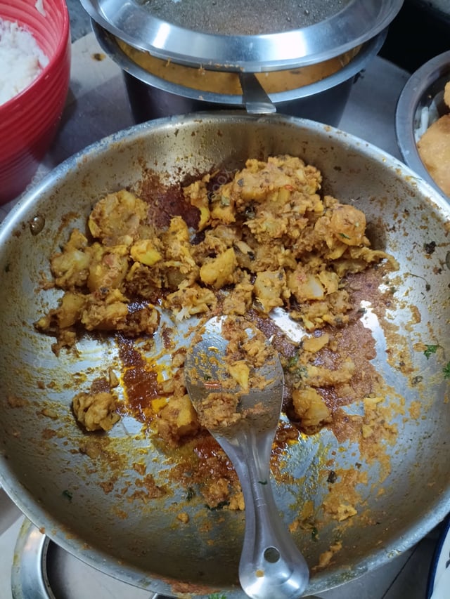 Tasty Aloo Patta Gobhi cooked by COOX chefs cooks during occasions parties events at home