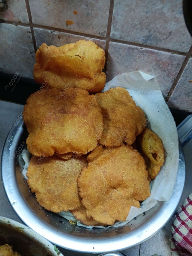 Delicious Pooris & Bedmis prepared by COOX