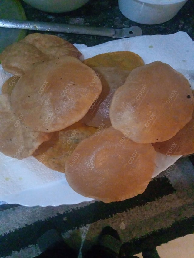 Delicious Pooris & Bedmis prepared by COOX