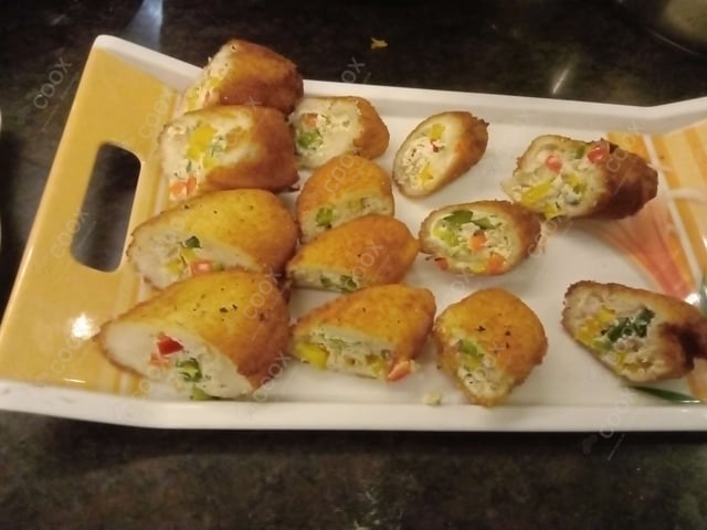 Delicious Dahi ke Sholey prepared by COOX