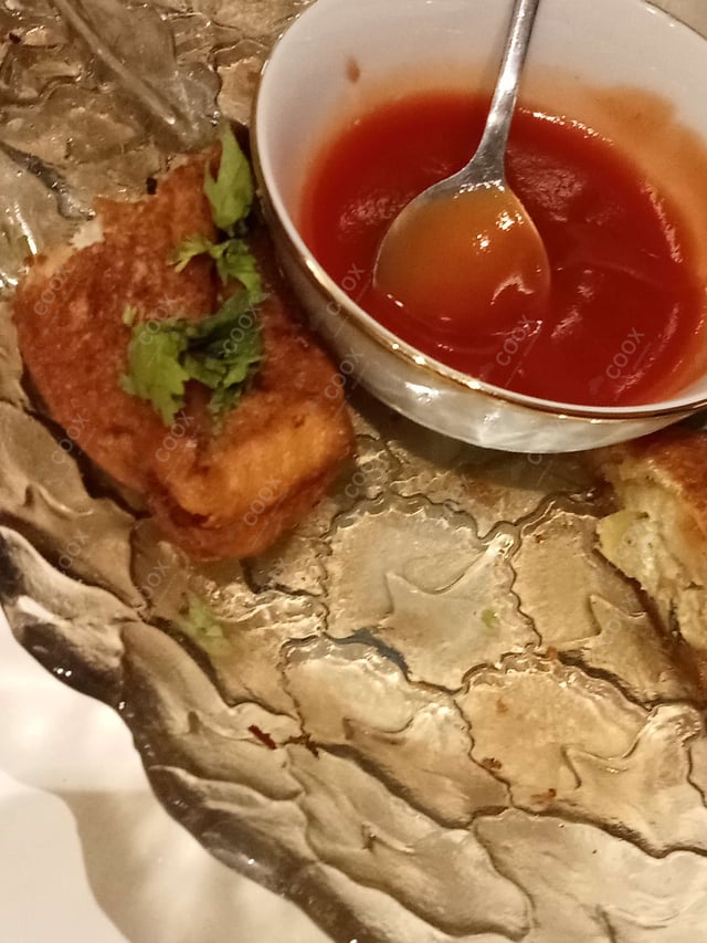 Delicious Dahi ke Sholey prepared by COOX