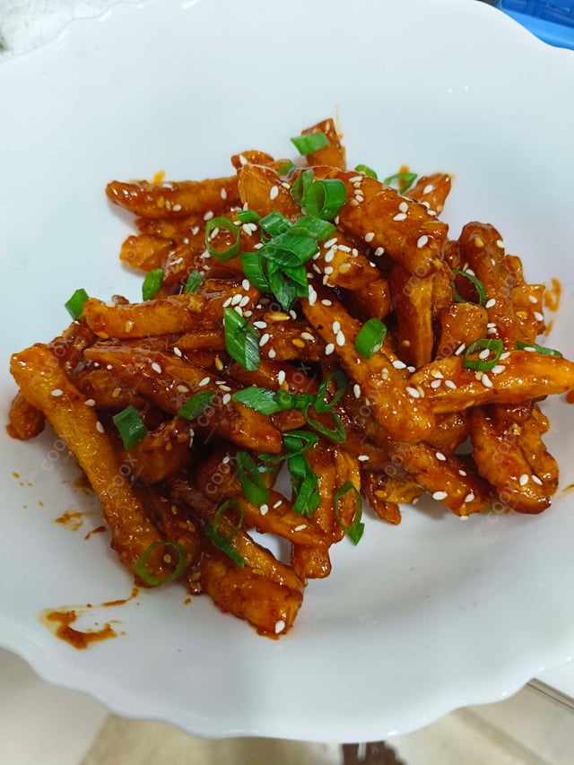 Delicious Honey Chilli Potato prepared by COOX