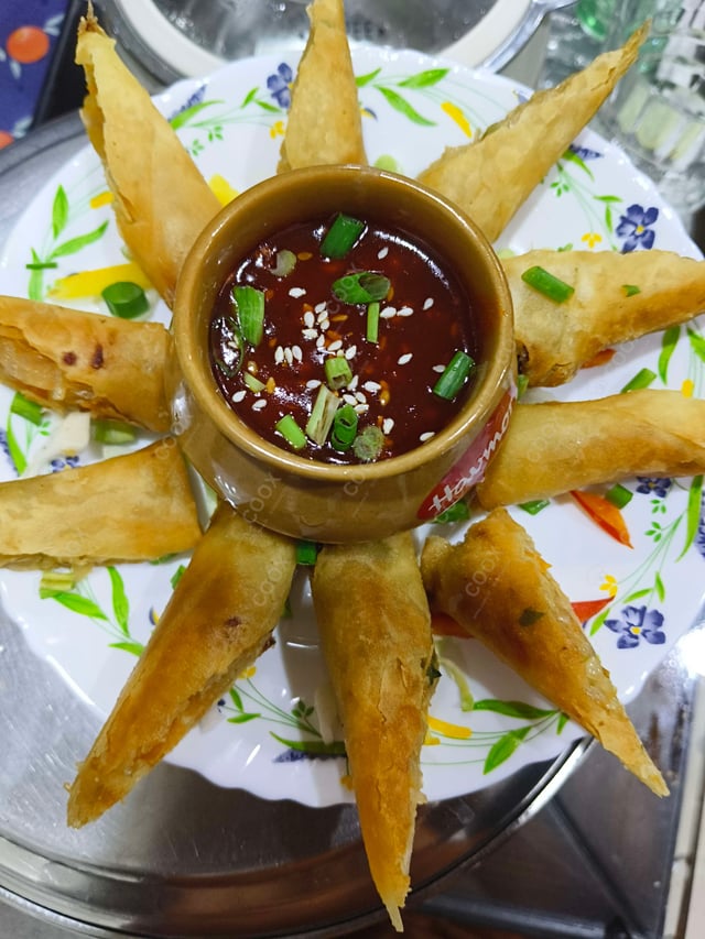 Delicious Veg Spring Rolls prepared by COOX