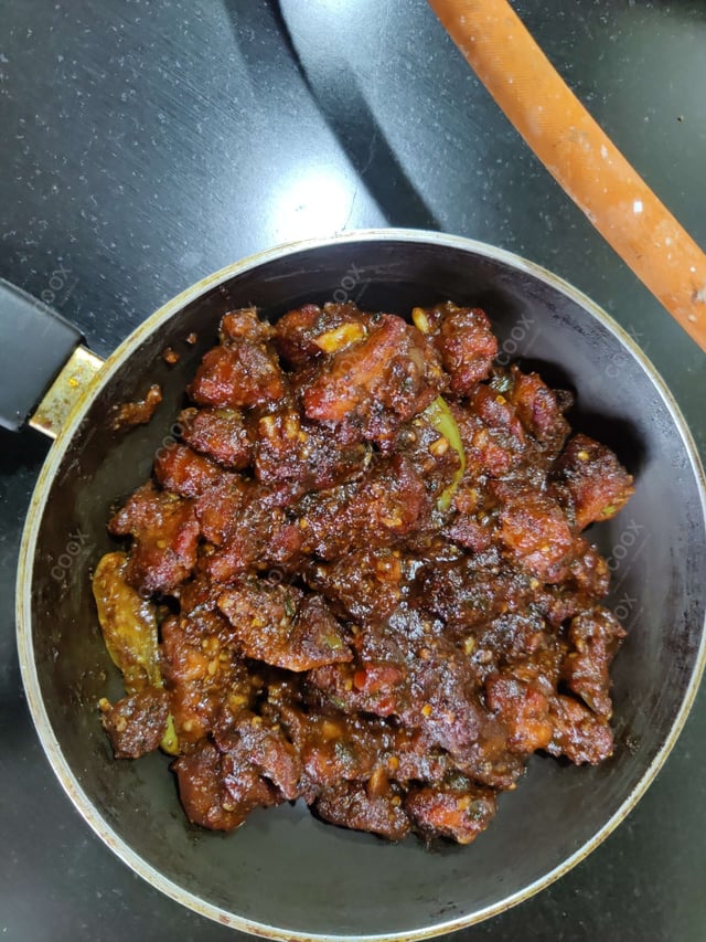 Delicious Chicken In Burnt Garlic Sauce prepared by COOX