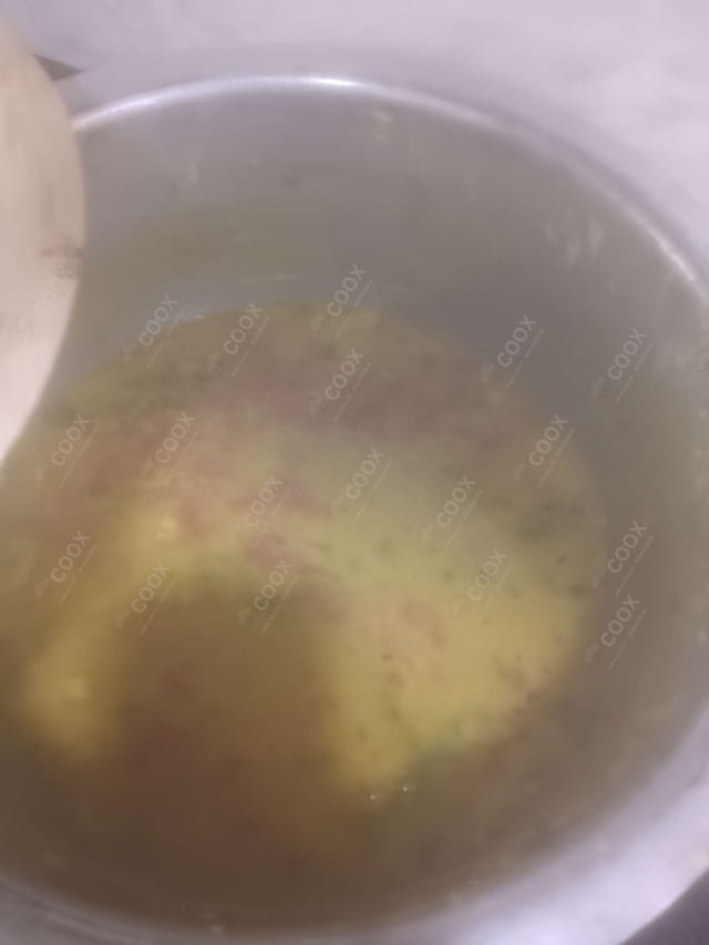 Delicious Dal Tadka prepared by COOX