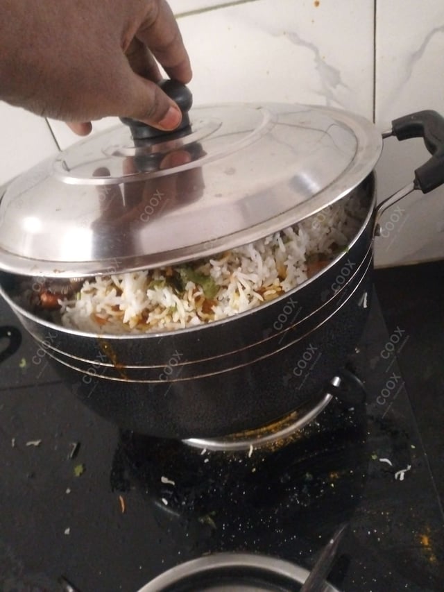 Delicious Chicken Biryani prepared by COOX