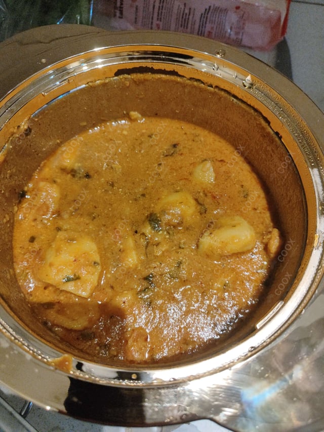 Delicious Stuffed Potatoes (Gravy) prepared by COOX