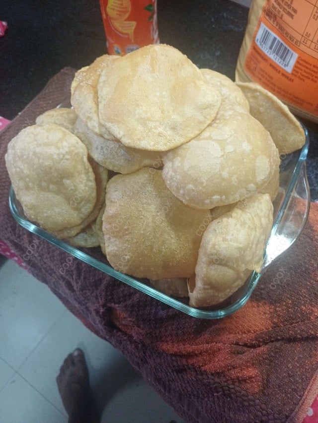 Delicious Pooris & Bedmis prepared by COOX