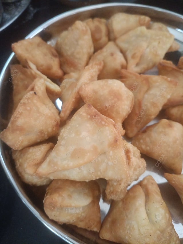 Tasty Dal Samosas cooked by COOX chefs cooks during occasions parties events at home