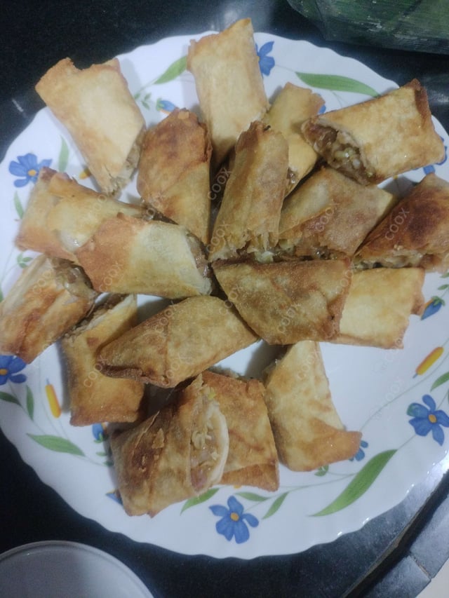Delicious Veg Spring Rolls prepared by COOX