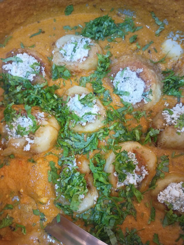 Delicious Stuffed Potatoes (Gravy) prepared by COOX