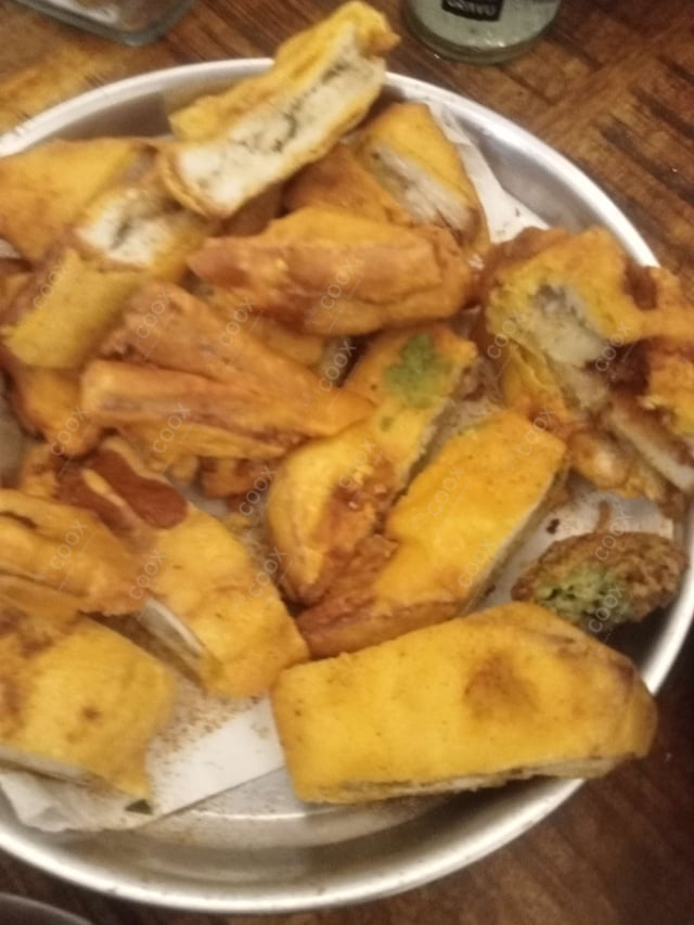 Tasty Bread Pakode cooked by COOX chefs cooks during occasions parties events at home