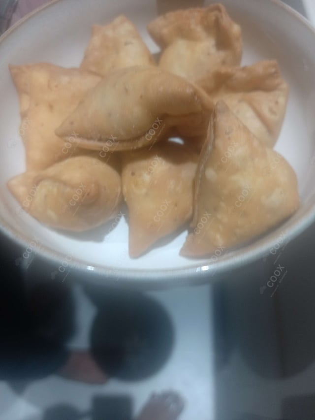 Delicious Mini Samosas prepared by COOX