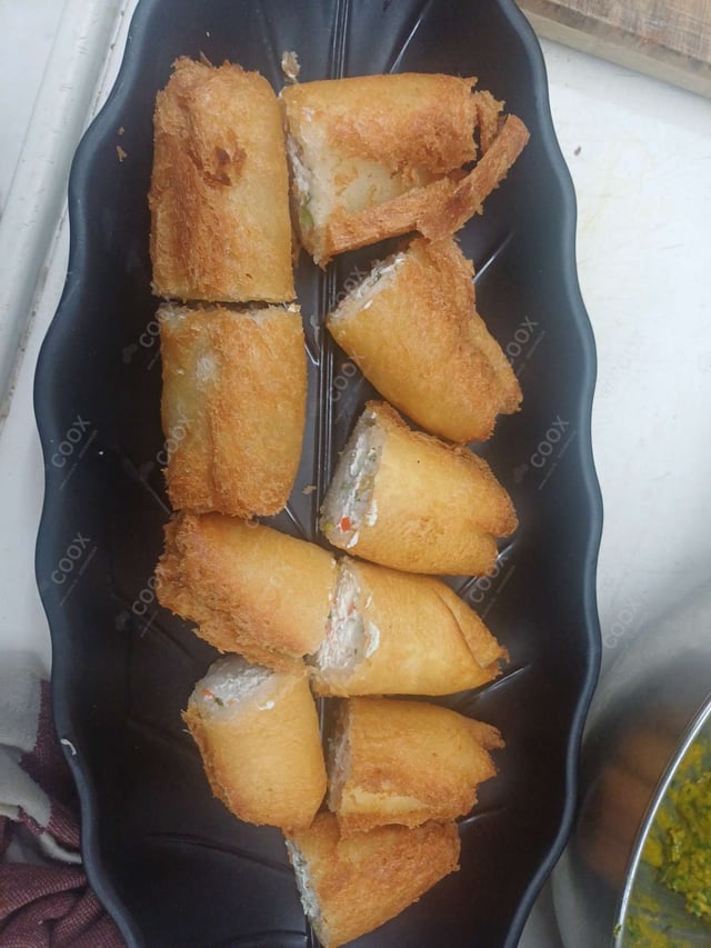 Delicious Dahi ke Sholey prepared by COOX