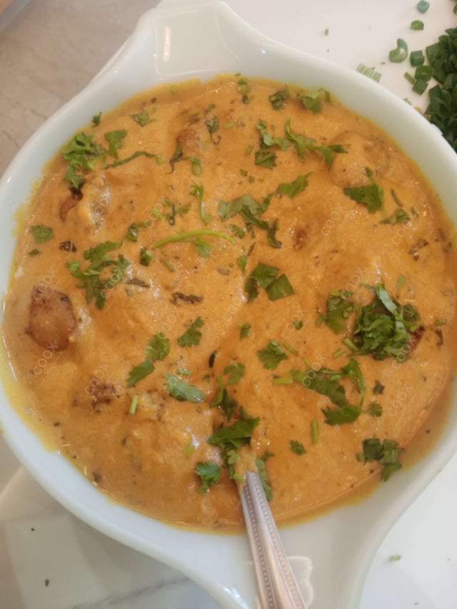Delicious Malai Kofta (Orange Gravy) prepared by COOX