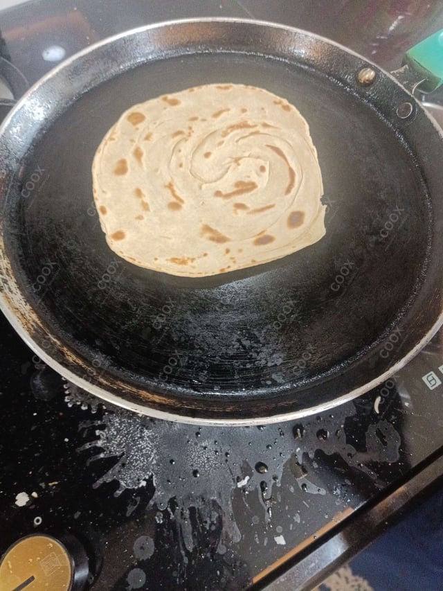 Delicious Tawa Rotis prepared by COOX