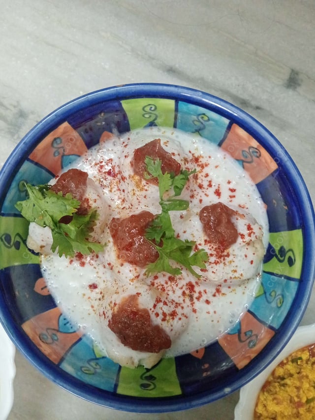 Delicious Dahi Bhalla prepared by COOX