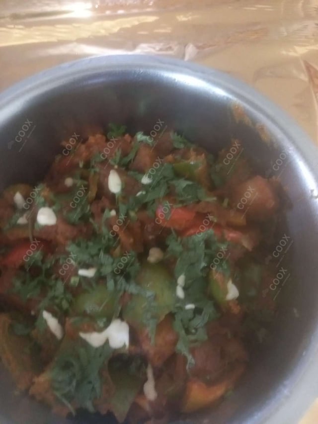 Tasty Aloo Shimla Mirch cooked by COOX chefs cooks during occasions parties events at home