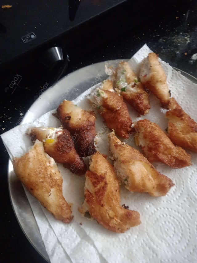 Delicious Dahi ke Sholey prepared by COOX