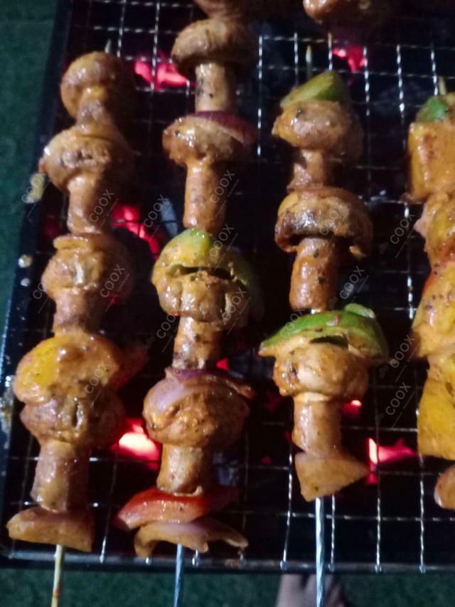 Delicious Mushroom Tikka prepared by COOX
